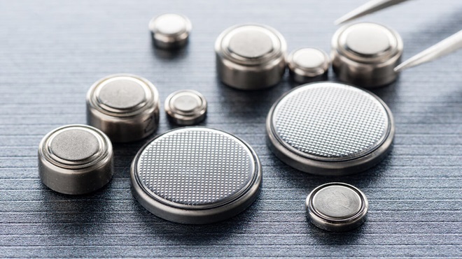 button batteries on a grey background